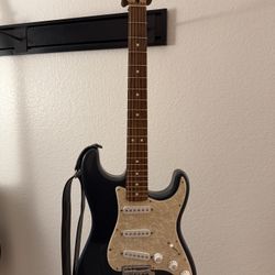 3 Guitars (2 Electric, 1 Acoustic)