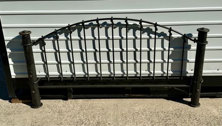 Black metal queen bed