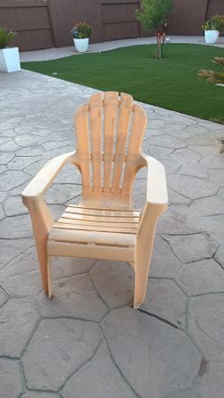 Peach plastic chair