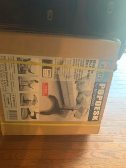 Pop desk for laptops ( adjustable ) new in box