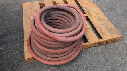 Fire hose with brass fittings water hose line firehose off of a fire truck