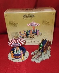 Mr. Christmas Gold Label World's Fair Vignette set, which includes a hot dog soda stand and a circus wagon. 2004 