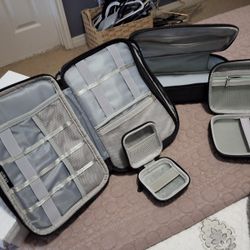 Four Electronics Organizer Travel Cases, Designed To Store and Organize Small Electronic Accessories. 
