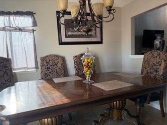 Dining table with chairs.