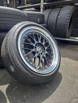 Set of four used wheels and tires 235/45-18 bridgestone