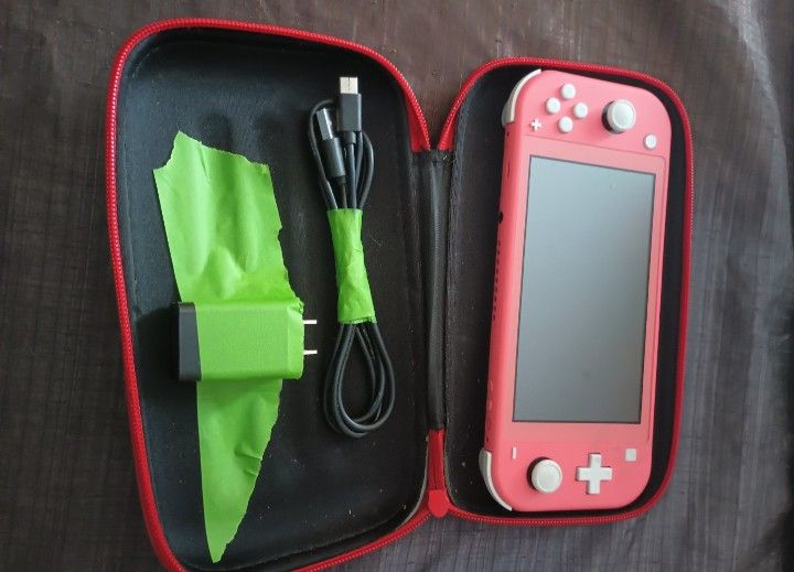 Nintendo Switch Lite Coral Pink And Case