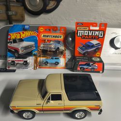 Toy Ford Bronco & Chevy Blazer trucks