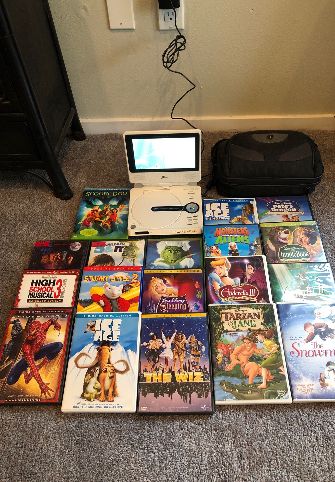 Portable DVD player with 18 kids DVDs