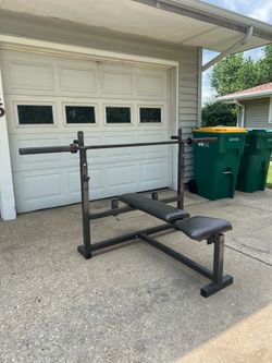 Olympic weight bench with Olympic barbell