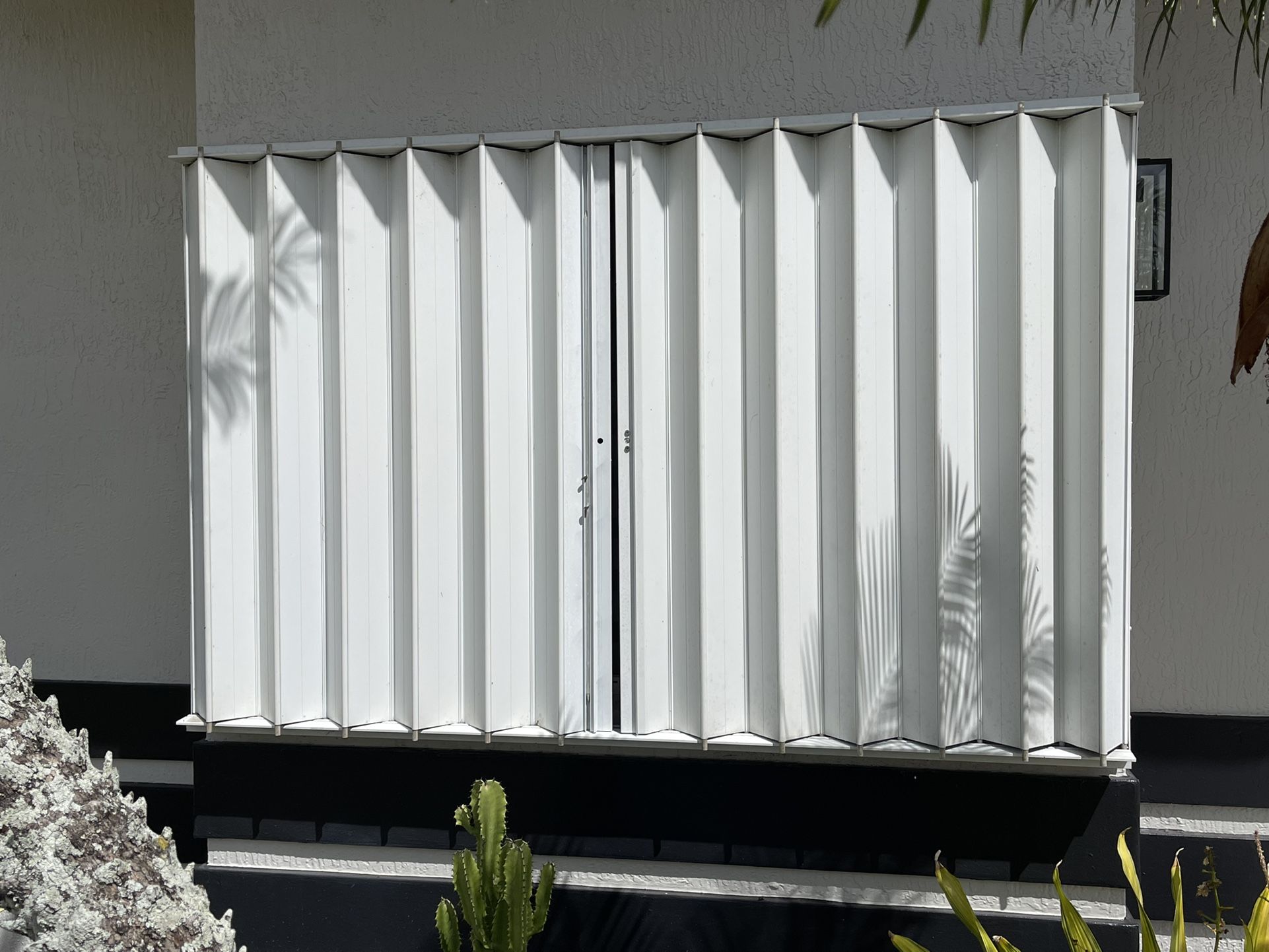 Hurricane Accordion Shutters White