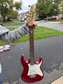 Electric Ibanez guitar with case