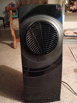Black Lasko Swivel Tower Heater.