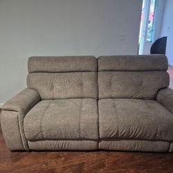 Grey reclining couch