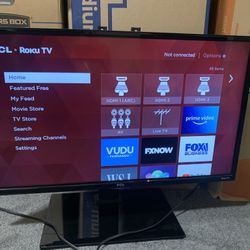 TCL 32" HD LED Roku Smart TV with TV Stand for 32 to 65 inch TVs