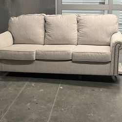 Sofa Couch with Armrest , Grey Fabric with Silver Nails Decoration  .