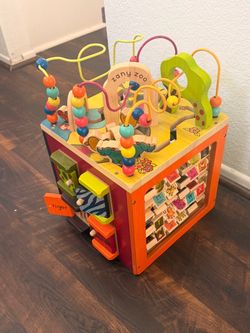 B. Toys Zany Zoo Wooden Activity Cube