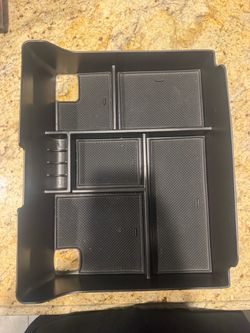 2016 Escalade arm rest center organizer