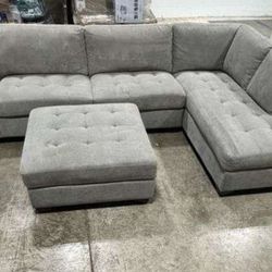 Beautiful Gray Tufted Sectional With Chaise. Storage Ottoman 