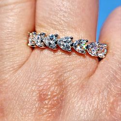 Cubic Zirconia Heart Shaped 18kt White Gold Plated Sterling Silver Infinity Band Ring.