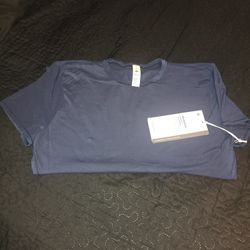 Lululemon Nulu Hip Length Cee Neck Short Sleeve. $50 Size XL