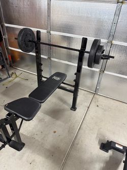 Marcy weight bench with bar and weights