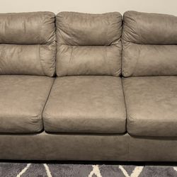 Tan Loveseat