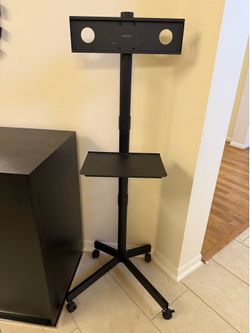 Rolling TV stand on wheels