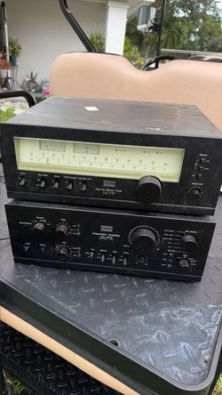 Vintage 1970s featuring the Sansui TU-717 AM/FM stereo tuner (top) and the Sansui AU-919 integrated stereo amplifier (bottom)