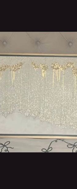 Beautiful gold  n silver bordered canvas wall art.