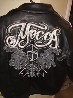 Black jacket, letterman design with embroidery. Made by Mecca