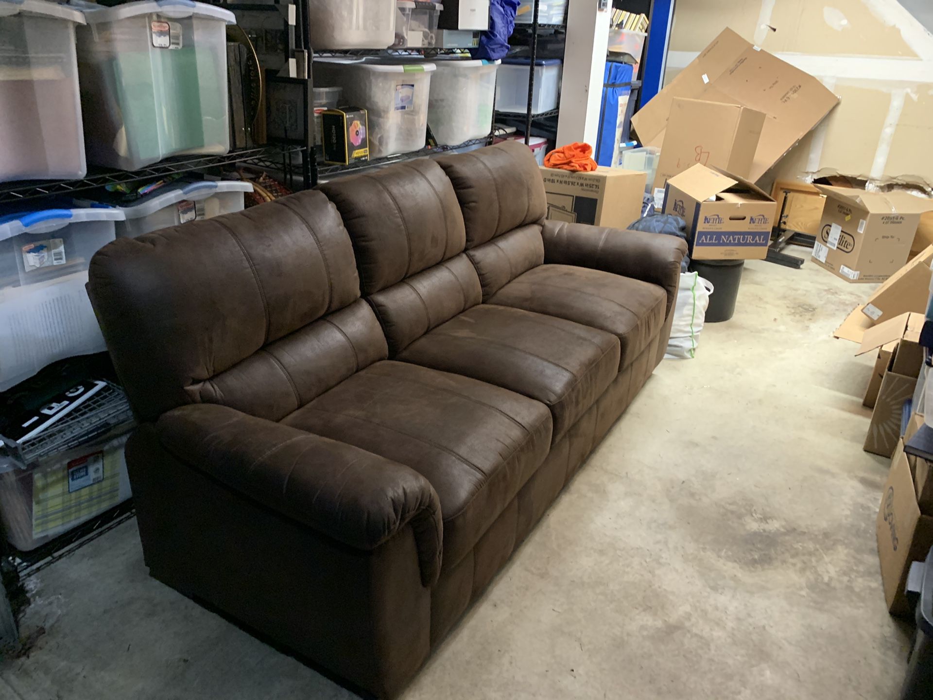 Brown faux leather couch (barely used, out of the box new)