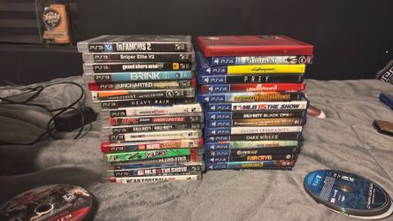 PS3 and ps4 games and a ps4 controller and head set