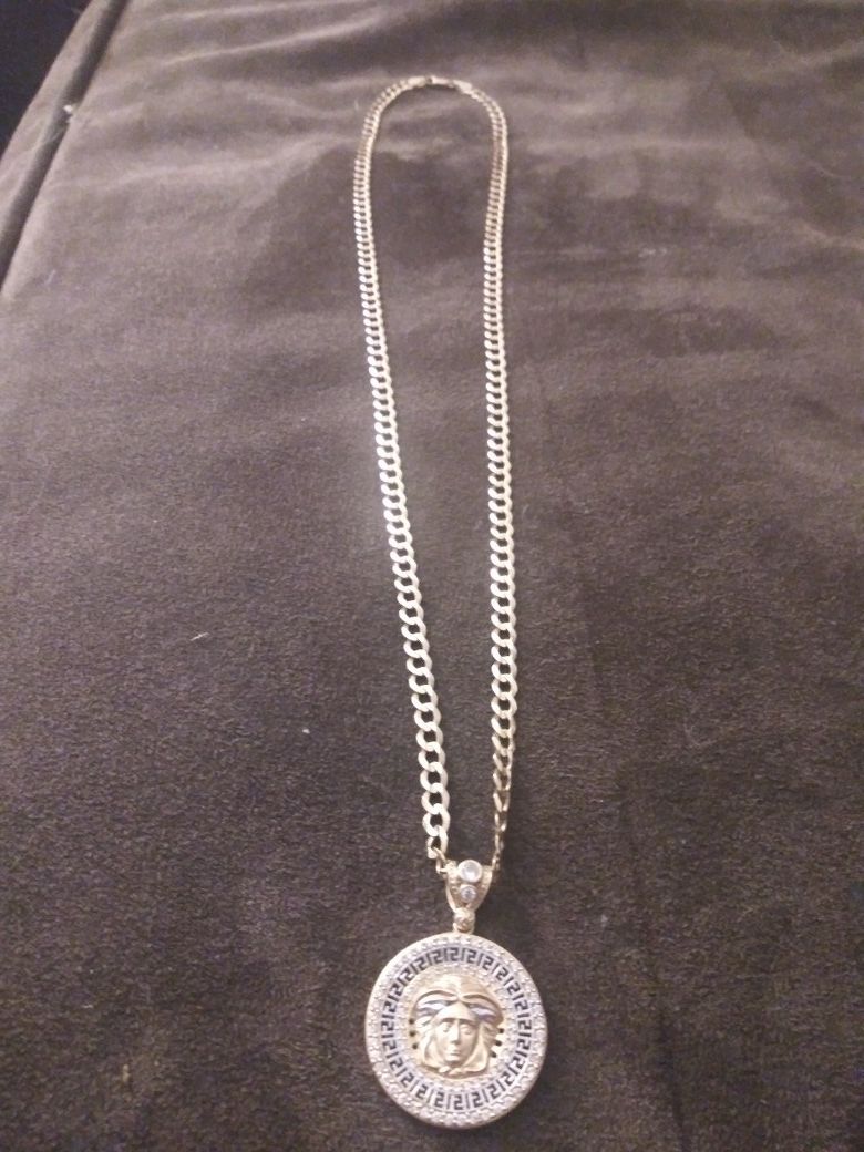 24 inch 14kt gold chain w/ 14kt Versace charm