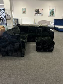 Black Corduroy Sectional With Ottoman 