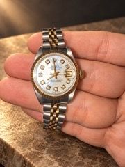 Rolex Datejust 69173 with two-tone Jubilee bracelet, fluted gold bezel, and custom mother-of-pearl diamond dial.