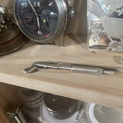 Weapon Hand Pours Silver