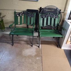 A Set Of Rod Iron/Wood Porch Chairs