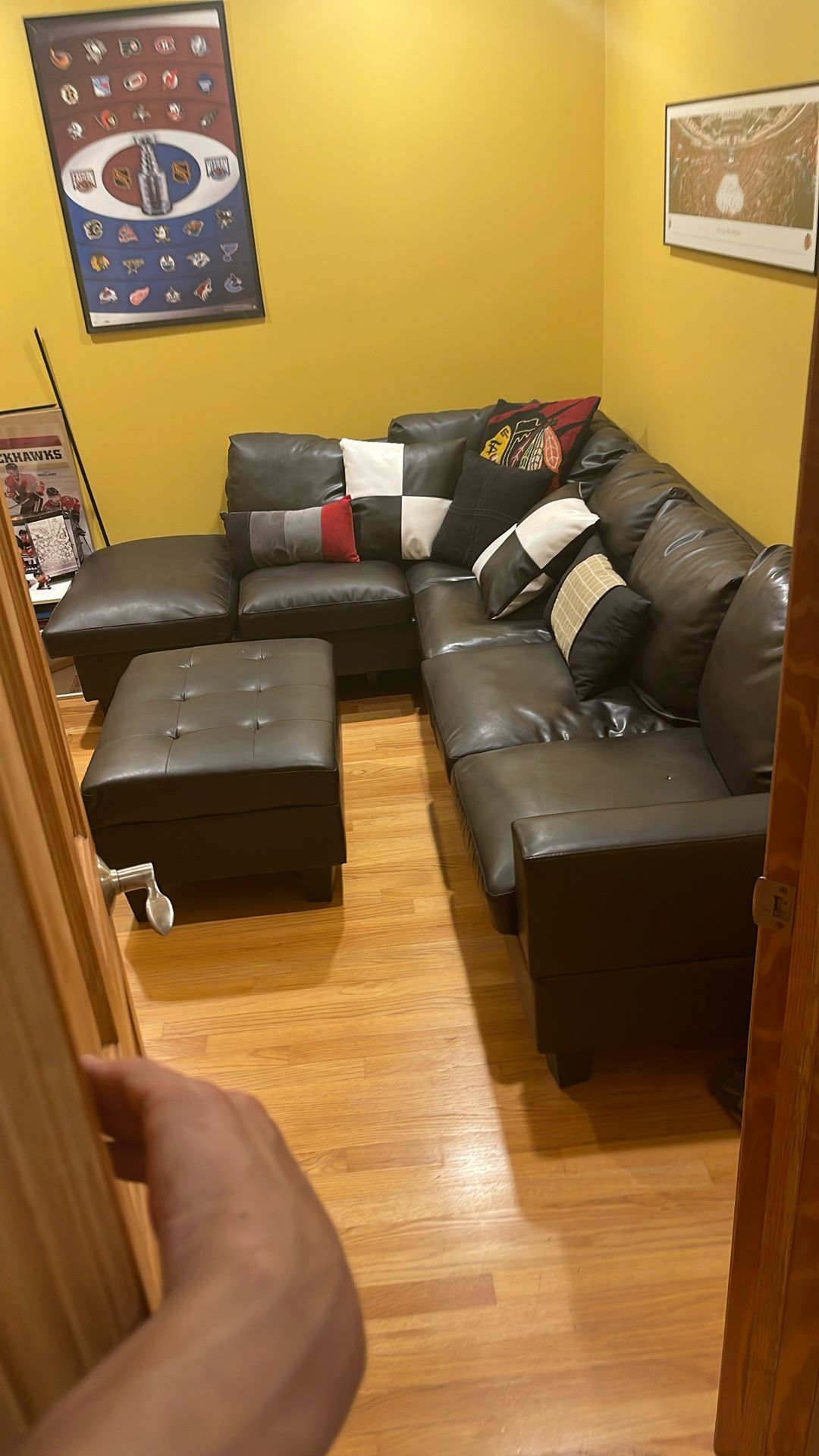 Faux Leather Sectional With Storage Ottoman