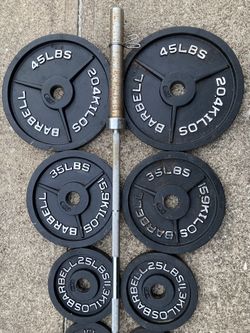 Olympic Weight Set 255lb weights plate plates 2 255 lb lbs 255lbs 45 35 25 10 5 2.5 hole size 300lb 300 300lbs CAP brand Barbell bar 7 foot 7 for Sale in Cleveland OH OfferUp