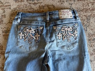 Miss Me Embellished Cross Bow Boot Cut Jeans. Size 31