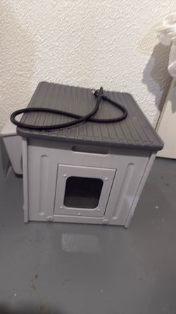 Electric outdoor cat house