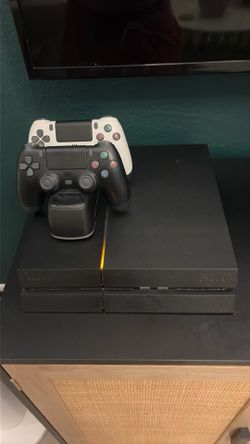 PS4 w/ games controller and Steering Wheel