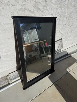 Dark brown mirror