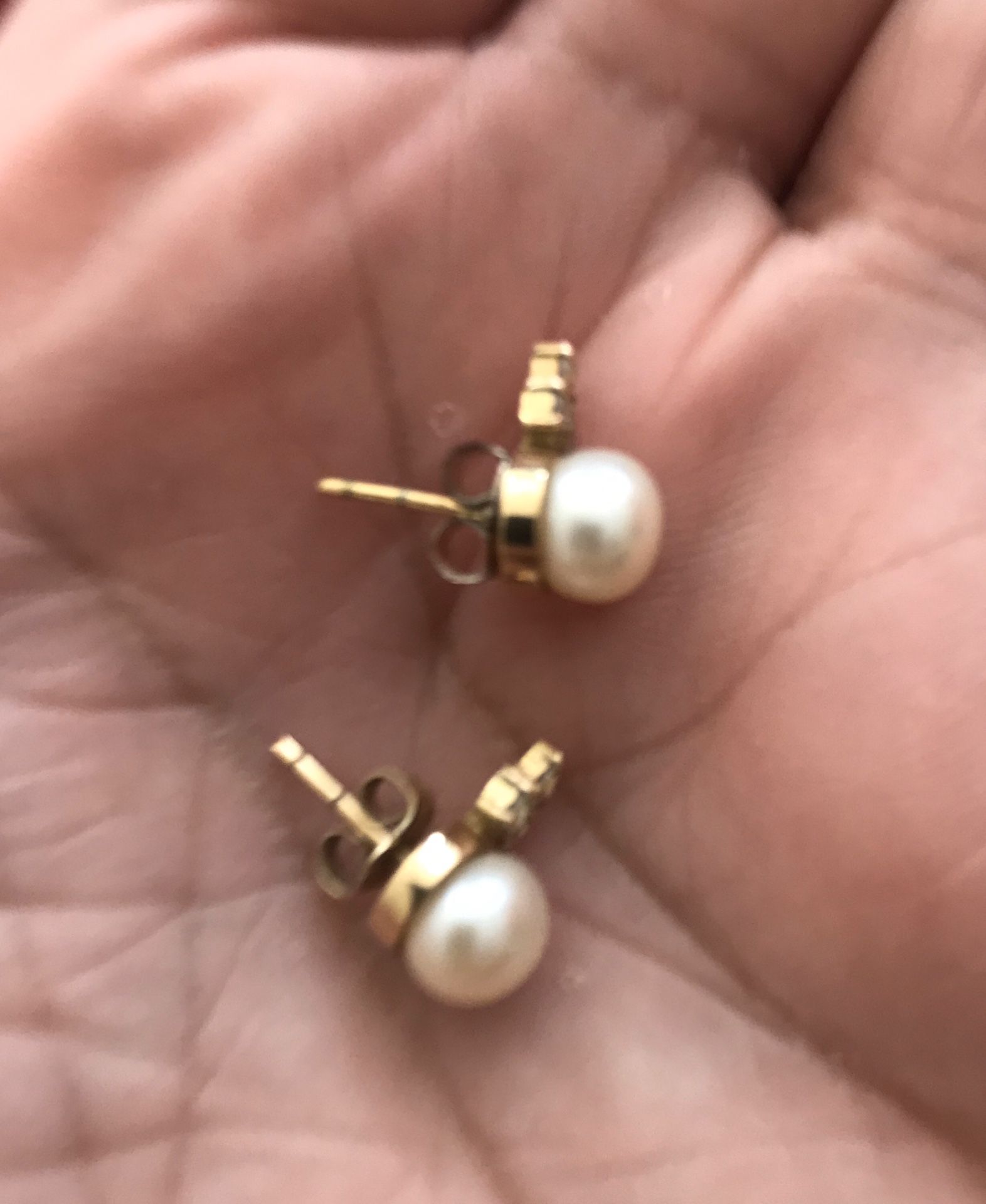 New. 14k yellow gold pearl and diamond earrings. Pearls are natural and diamonds real. Solid gold. Great gift for the woman in your life for Chri