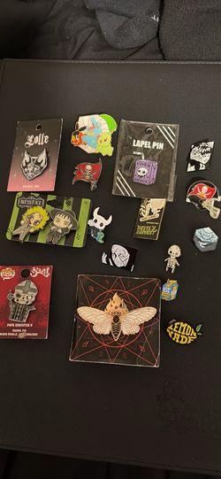Collection of different pins some brand new