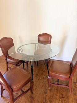 Glass dining table with 4 chairs