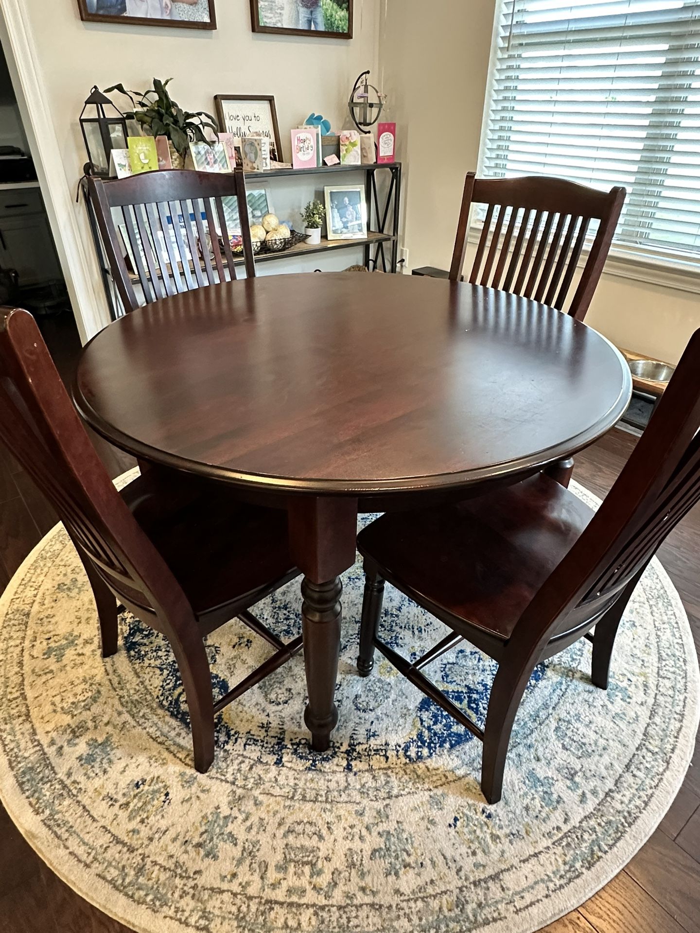 Cherry Round Kitchen Table And Rug