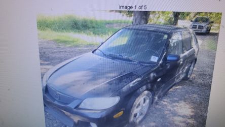 FOR PARTS A 2003 MAZDA PROTEGE 5