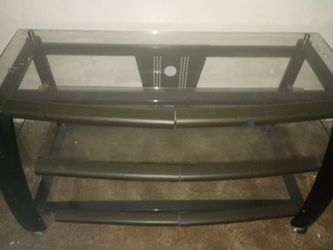 Glass TV stand just needs a good cleaning