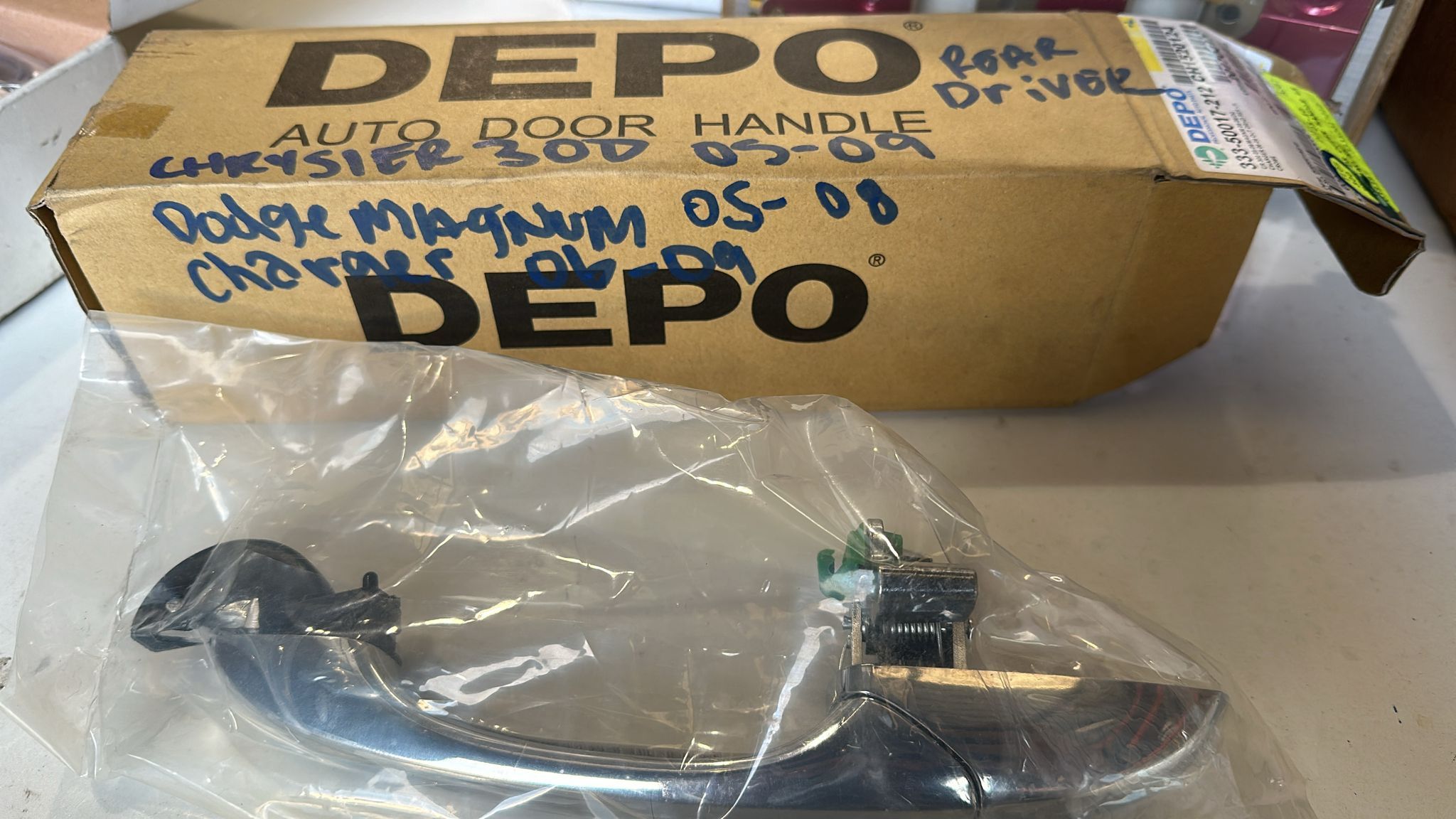 Rear driver door handle